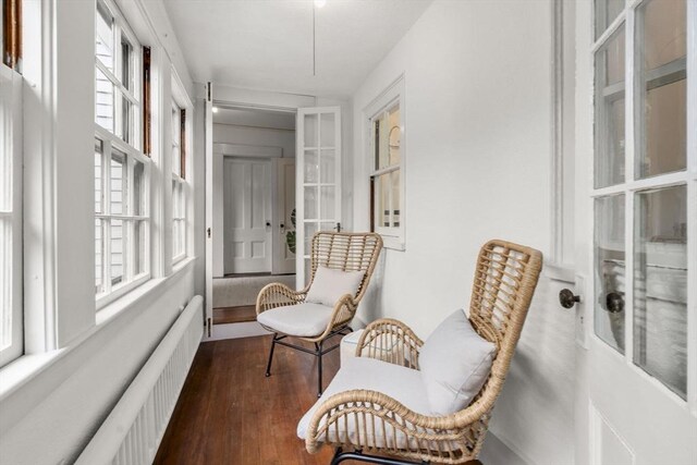 33 Wellington Ln, Belmont, MA 02478 - sunroom with radiator heating unit and french doors