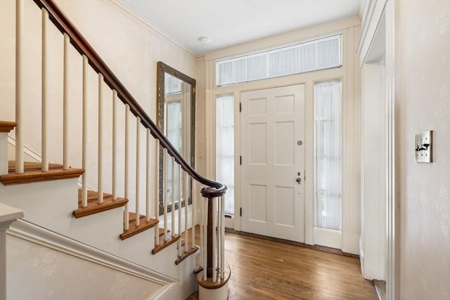 33 Wellington Ln, Belmont, MA 02478 - foyer entrance featuring stairway, wood finished floors, and ornamental molding