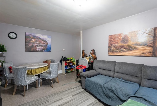 8 Everett St, Somerville, MA 02143 - living room with light wood-style floors and baseboards