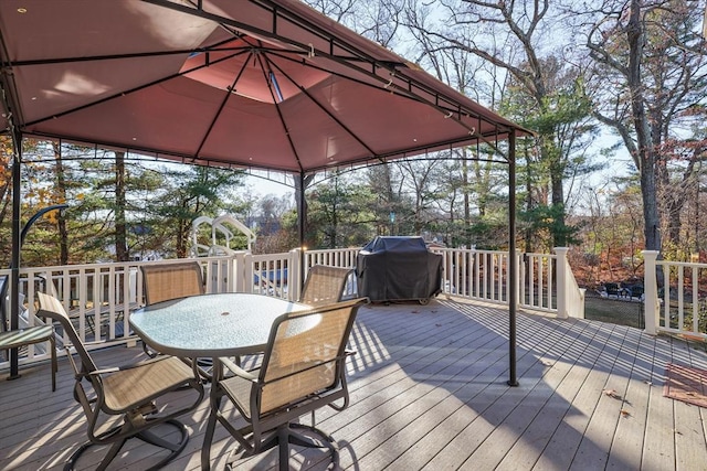 deck featuring area for grilling and a gazebo