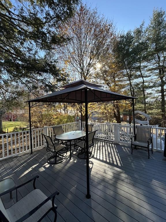 wooden deck with a gazebo