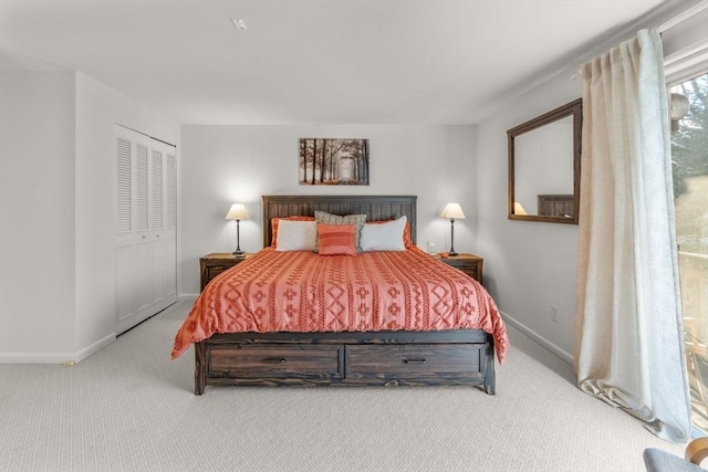 carpeted bedroom featuring a closet