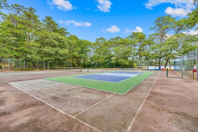 view of sport court featuring basketball hoop