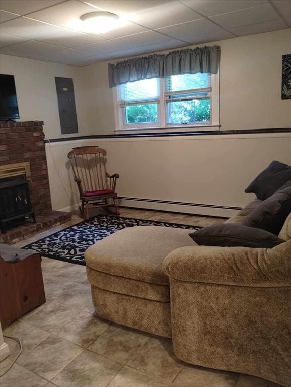 living room featuring a baseboard heating unit, electric panel, and a fireplace