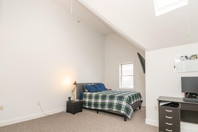 carpeted bedroom featuring lofted ceiling