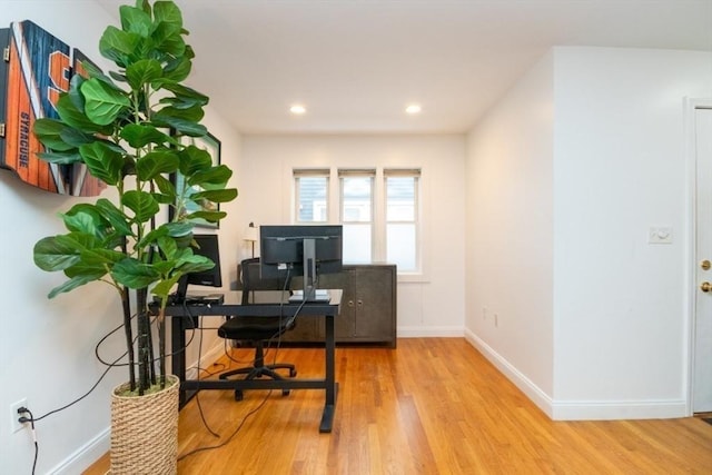 office space featuring light wood-type flooring