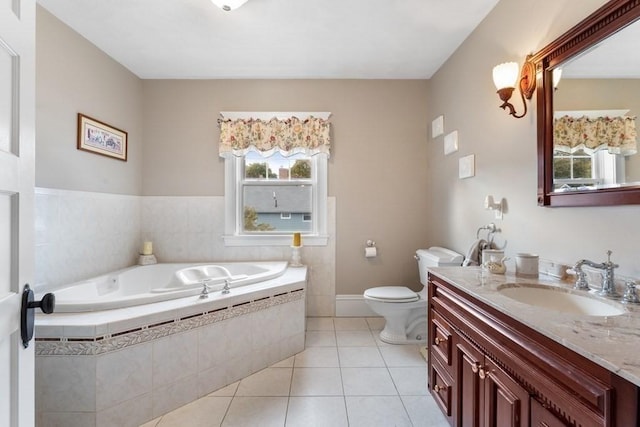 bathroom with toilet, tile patterned floors, tiled tub, and vanity