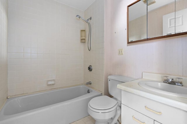 bathroom featuring tile patterned flooring, shower / bathtub combination, toilet, and vanity