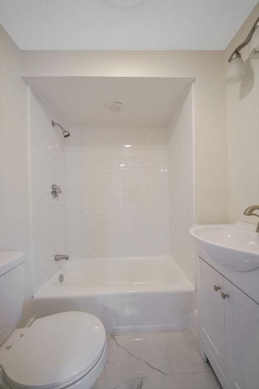 9 Garfield St, Dartmouth, MA 02748 - full bathroom with toilet, shower / bathtub combination, vanity, and marble look tile flooring