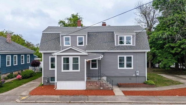 9 Garfield St, Dartmouth, MA 02748 - colonial inspired home featuring roof with shingles and a chimney