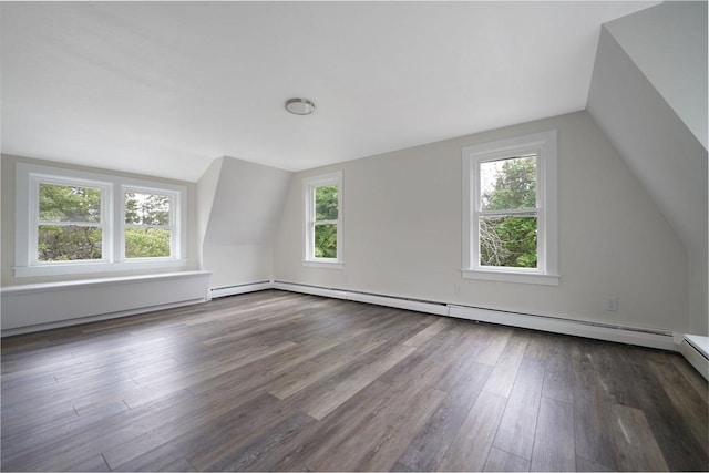 9 Garfield St, Dartmouth, MA 02748 - bonus room with vaulted ceiling, healthy amount of natural light, wood finished floors, and baseboard heating