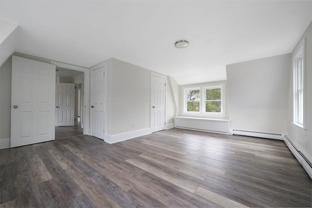 9 Garfield St, Dartmouth, MA 02748 - bonus room featuring wood finished floors, a baseboard radiator, lofted ceiling, and baseboards
