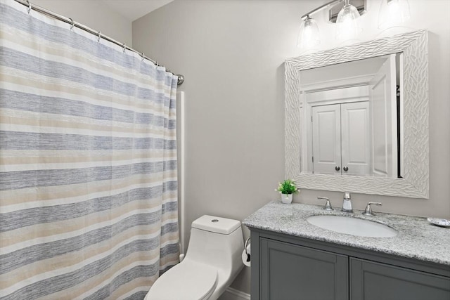 60 Starbird Ave Unit 2, Boston, MA 02131 - bathroom featuring vanity, toilet, and curtained shower