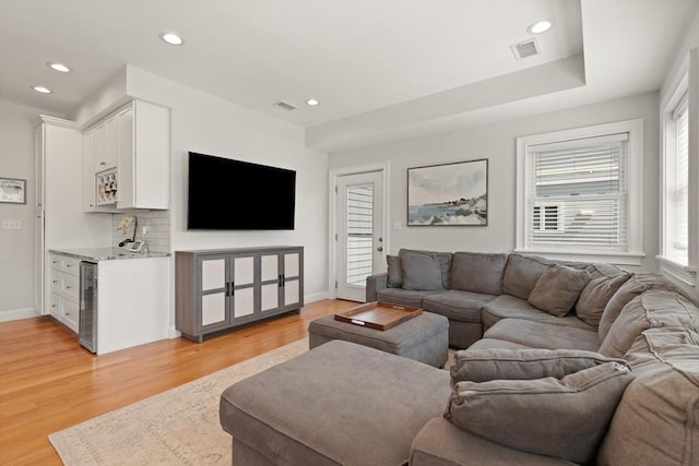 60 Starbird Ave Unit 2, Boston, MA 02131 - living room featuring light wood-style flooring, recessed lighting, baseboards, and beverage cooler