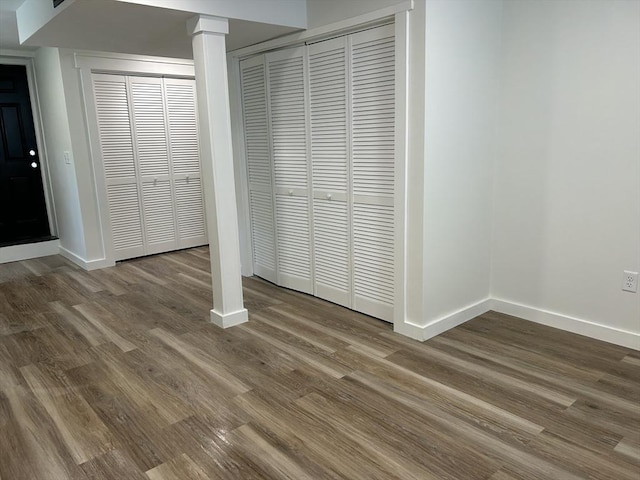 61 Esta Rd, Plymouth, MA 02360 - unfurnished bedroom with wood finished floors and decorative columns