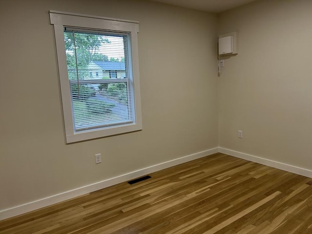 61 Esta Rd, Plymouth, MA 02360 - unfurnished room with wood finished floors and baseboards