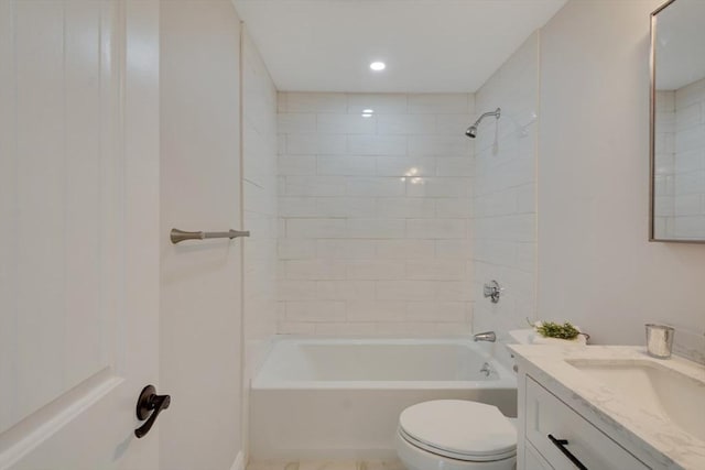 bathroom with recessed lighting, vanity, toilet, and tub / shower combination