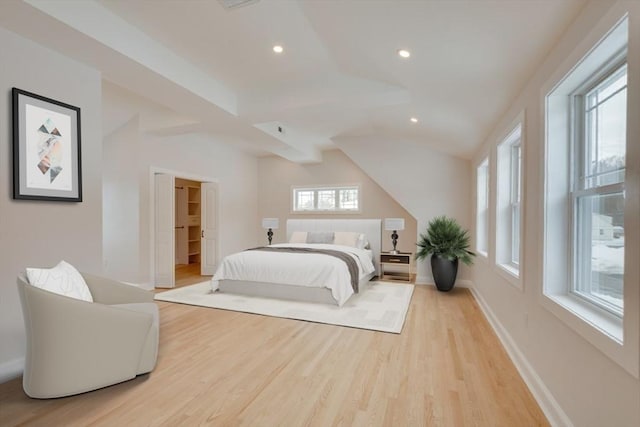 bedroom with light wood-style floors, recessed lighting, and baseboards