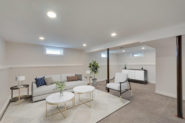 living room with recessed lighting, baseboards, plenty of natural light, and carpet