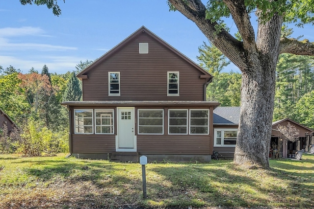 view of property with a front lawn