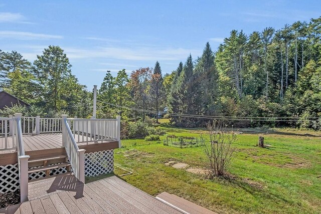 wooden deck with a yard