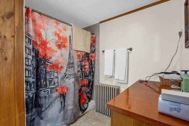 utility room featuring radiator