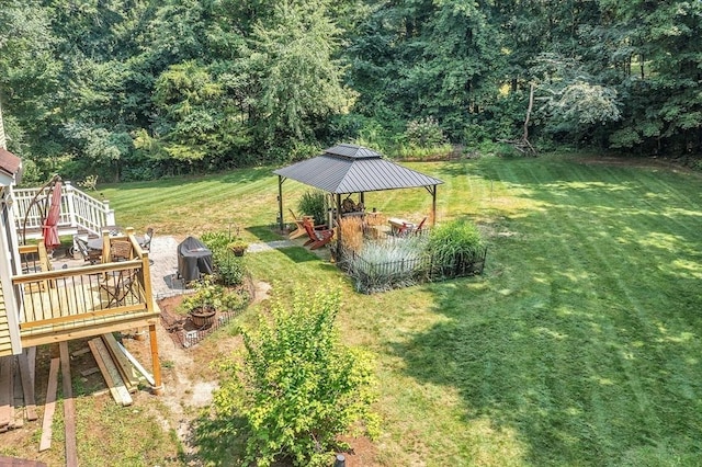 view of yard featuring a gazebo and a deck