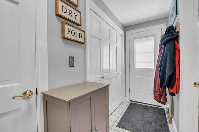 entryway featuring light tile patterned floors