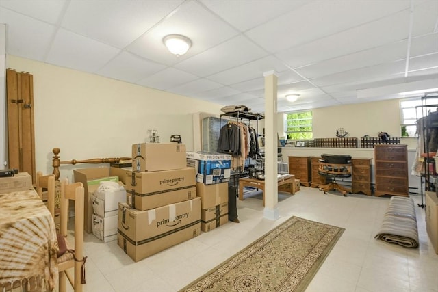 below grade area with a paneled ceiling