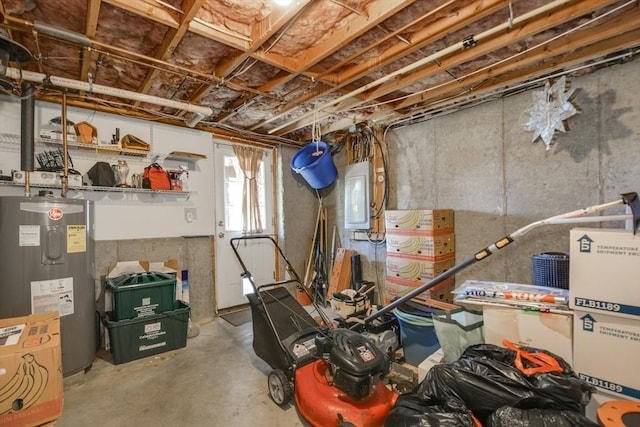 below grade area featuring electric water heater and electric panel