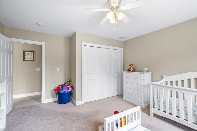 53 Arnold Way, Uxbridge, MA 01569 - bedroom with light carpet, a closet, a ceiling fan, and a nursery area