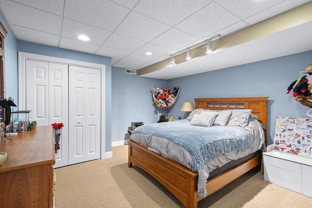 53 Arnold Way, Uxbridge, MA 01569 - bedroom with carpet, a closet, recessed lighting, a drop ceiling, and rail lighting