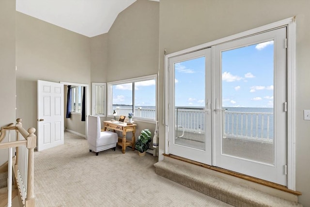 125 Seaview Dr, Plymouth, MA 02360 - living area with baseboards, carpet, and high vaulted ceiling