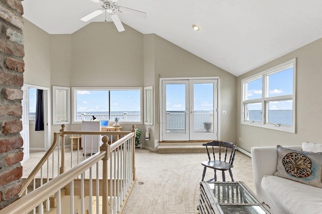125 Seaview Dr, Plymouth, MA 02360 - living room featuring a baseboard heating unit, light colored carpet, ceiling fan, and high vaulted ceiling