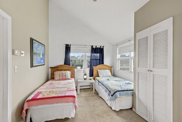 125 Seaview Dr, Plymouth, MA 02360 - carpeted bedroom with a baseboard heating unit and high vaulted ceiling