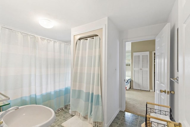 125 Seaview Dr, Plymouth, MA 02360 - bathroom with a shower with shower curtain and baseboards