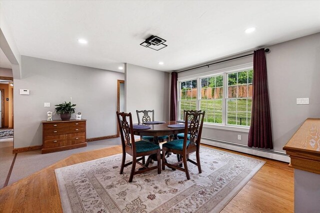 447 Coy Hill Rd, Warren, MA 01083 - dining room with a baseboard heating unit, light wood-style flooring, recessed lighting, and baseboards