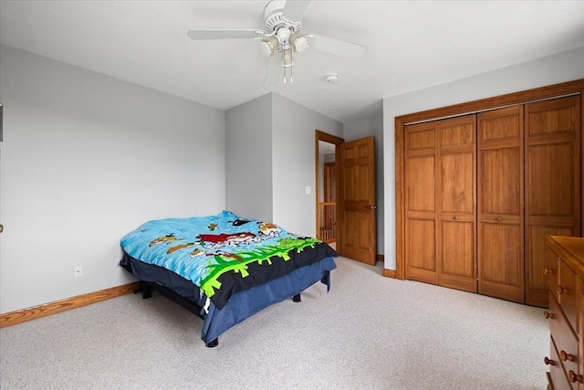 447 Coy Hill Rd, Warren, MA 01083 - bedroom with light carpet, baseboards, a ceiling fan, and a closet