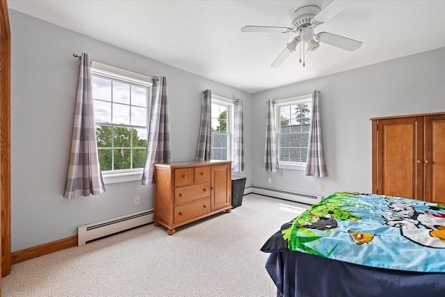447 Coy Hill Rd, Warren, MA 01083 - bedroom featuring a baseboard heating unit, light colored carpet, baseboards, and ceiling fan