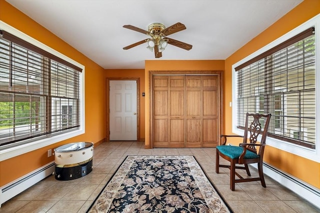 447 Coy Hill Rd, Warren, MA 01083 - entryway with a baseboard heating unit, plenty of natural light, and light tile patterned flooring