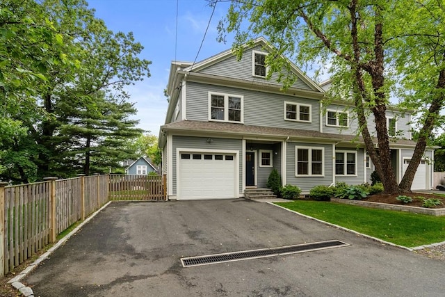 2 Rockwood Ter Unit 2, Newton, MA 02466 - view of front of property featuring asphalt driveway and a garage