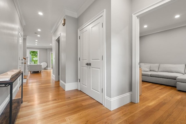 2 Rockwood Ter Unit 2, Newton, MA 02466 - hallway with ornamental molding, light wood finished floors, recessed lighting, and baseboards