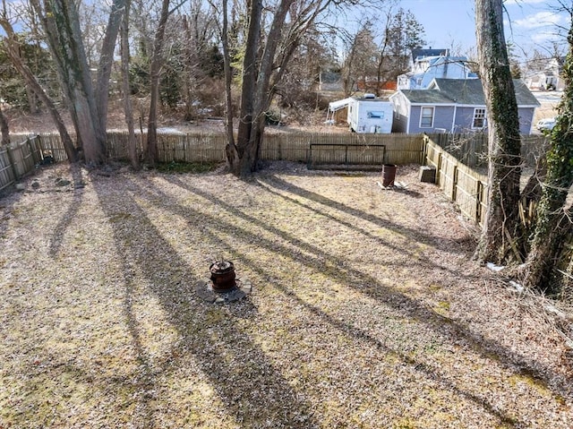 view of yard with a fenced backyard