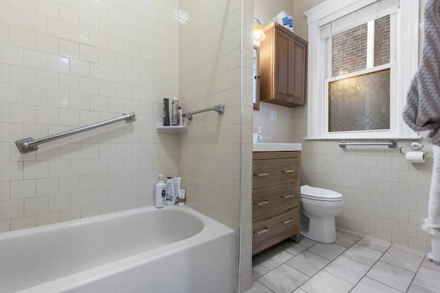 130 Glenville Ave, Boston, MA 02134 - full bathroom with a bathtub, vanity, and tile walls