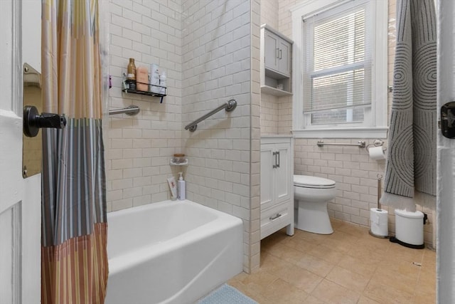 130 Glenville Ave, Boston, MA 02134 - bathroom featuring tile walls, shower / tub combo, and tile patterned flooring