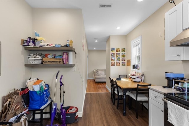 130 Glenville Ave, Boston, MA 02134 - home office featuring dark wood finished floors and recessed lighting