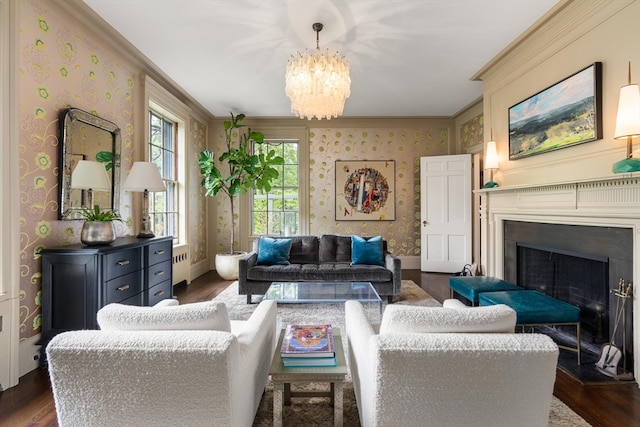 living room featuring ornamental molding, an inviting chandelier, radiator heating unit, and dark wood-type flooring