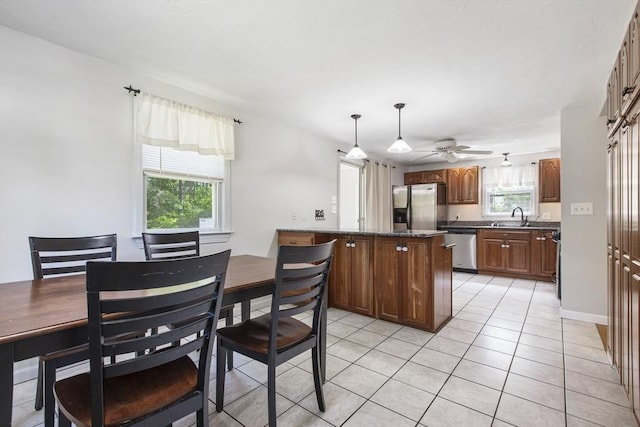 7 Cornish St, Carver, MA 02330 - dining space featuring light tile patterned floors and ceiling fan