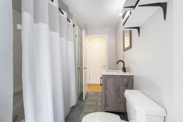 7 Cornish St, Carver, MA 02330 - bathroom with toilet, vanity, curtained shower, and tile patterned floors