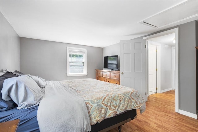 7 Cornish St, Carver, MA 02330 - bedroom with light wood-style floors, baseboards, and attic access